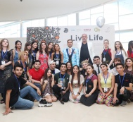 Leyla Aliyeva meets students doing a practical summer work at the exhibition “Live Life”