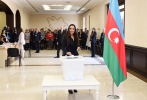 President Ilham Aliyev and family members vote at Polling Station No.6